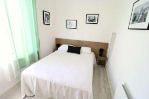 Appartements Appartement proche centre, marche et plage : photos des chambres