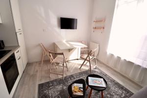 Appartements Appartement proche centre, marche et plage : photos des chambres