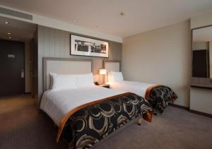 Deluxe Double & Single Room room in Clayton Hotel Chiswick