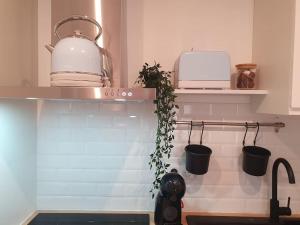 Appartements Coup de coeur assure : photos des chambres