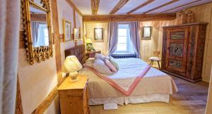 Appartements Remparts de Riquewihr - Le Renard & les Raisins : photos des chambres