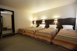 Hotels Hotel Au Petit Caporal : photos des chambres