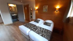 Hotels Logis Hotel & Spa Beau-Site : photos des chambres