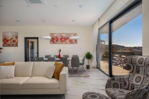 Luxury villa Sun and Moon with infinity heated pool for 16 up to 19 people by the sea in Razanj