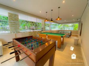 Apt Novíssimo em Riviera com Piscina Aquecida e Serviço de Praia