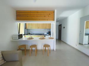 Seaside Apartment Corralejo : A cozy holiday home in a peaceful well located green complex