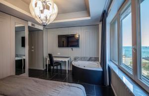 Deluxe Doppel-/Zweibettzimmer mit Whirlpool