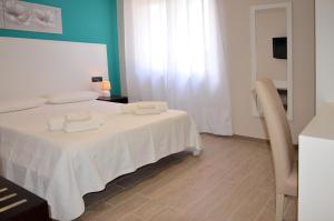 Comfort Triple Room room in La Conchiglia Suites & Spa