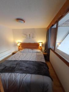 Appartements Chamrousse 1700 - Asters A03 (Rez de Jardin, Terrasse plein sud) : photos des chambres