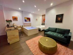 Appartements Colline, La suite spa privee clim : photos des chambres