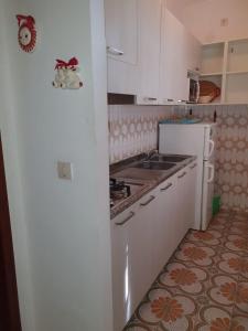 Spacious flat with terrace, pool and play area