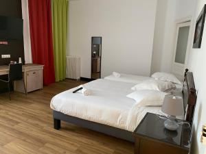 Enzo Hotels Limoges Centre Jourdan by Kyriad Direct : photos des chambres