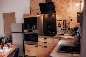 Appartements Gite avec spa Les Hauts de Monsegu : photos des chambres