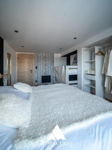 Chalets ATPeak Lodge Maison de Montagne d'exception : photos des chambres