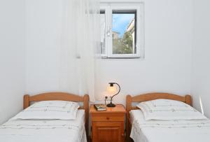 Apartments by the sea Seget Vranjica, Trogir - 10438