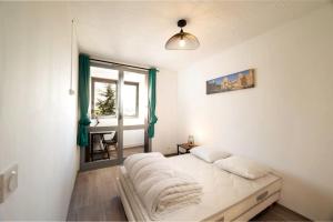 Appartements Appartement tout equipe climatise 8 couchages : photos des chambres