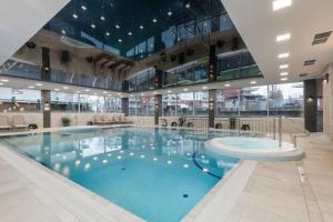 Apartament Holiday 32 - 4hvězdičkové hotely ve městě Rewal