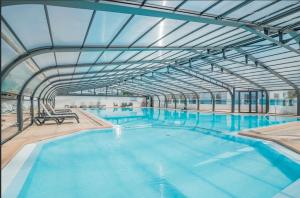 Chalets Vacances a 6 dans ce beau chalet avec piscine : photos des chambres