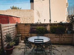 Apt RDC avec sa terrasse privée