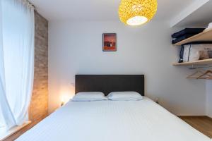 Appartements Le 05-GregIMMO-Appart'Hotel : photos des chambres