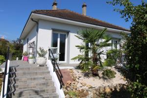 Sejours chez l'habitant Chambre parentale avec salle de bain partagee, acces independant chez Olivia : photos des chambres