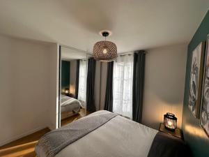 Appartements L'escale du Trianon : photos des chambres