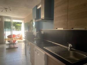 Appartements IBIZA Studio Cosy, parking privatif, wifi, clim, 5 mn plage : photos des chambres