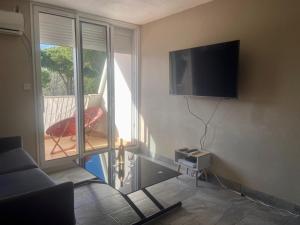 Appartements IBIZA Studio Cosy, parking privatif, wifi, clim, 5 mn plage : photos des chambres