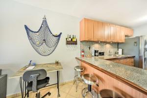 Breezy Condo with Ocean View Balcony Walk to Beach!