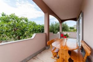 Three-Bedroom Apartment room in Apartments Mladen