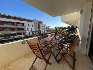 Appartement 2 pièces cosy avec terrasse et garage privé, proche plage - FR-1-338-5