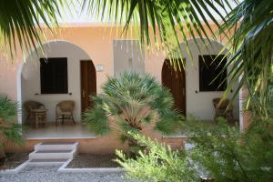 Triple Room with Patio room in Garden Hotel Ripa