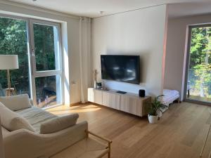 Sunny apartment with forest view