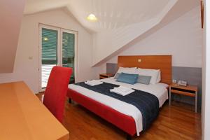 One-Bedroom Apartment with Balcony and Sea View room in Apartments Vala