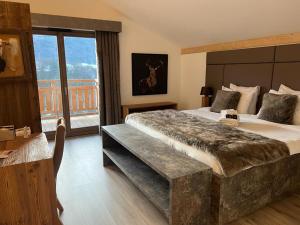 Appartements Les Trois Chaufatons - Chalets Boutiques, Proprietes Mont Amour : photos des chambres