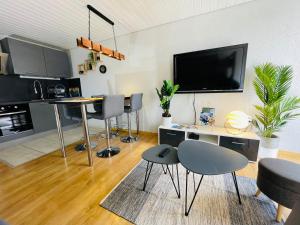 Appartements Au Doubs Village : photos des chambres