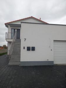 Neubau Appartement mit Terasse, privater Eingang,Parkplatz,Küche