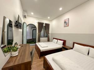 Phòng 4 người nhìn ra vườn (Quadruple Room with Garden View)