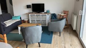 Maisons de vacances Maison cosy a 400 m de la mer! : photos des chambres