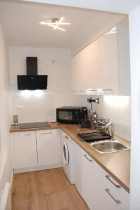 Appartements Suite avec terrasse, Nancy Thermal, parc Ste Marie : photos des chambres