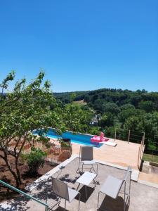 Maisons de vacances Maison avec magnifique vue et piscine privative : photos des chambres