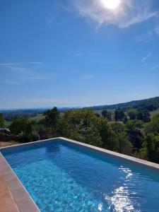 Maisons de vacances Maison avec magnifique vue et piscine privative : photos des chambres