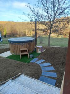 Campings L'encantada- Roulotte : photos des chambres