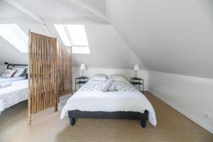 Appartements La Grande Maison Gannat : photos des chambres