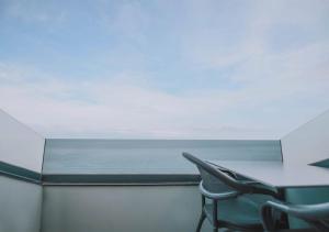 Elite Suite with Sea View and Balcony room in Peerless Villas Hotel