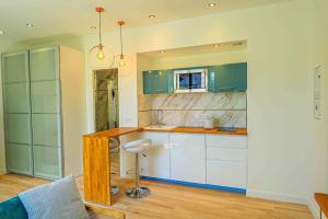 Appartements Studio de Luxe Meuble ,Clim et Parking Options, lave-linge : photos des chambres