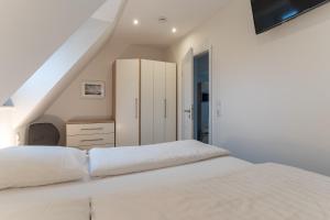 Appartementhaus Olsdorfer Straße Appartement Glücksmomente oben