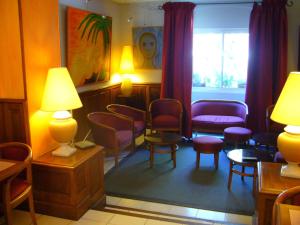 Hotels Hotel Les Palmiers : photos des chambres