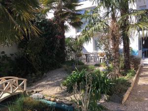Appartements Rez-de-Jardin T3/4 avec Jardin, Parking Prive - Proche Plage et Centre-ville - FR-1-92-910 : photos des chambres