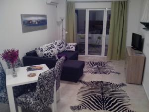 One-Bedroom Apartment with Balcony room in Location Apartments